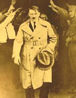 Adolf_Hitler_walking_out_of_Brown_House_after_1930_elections