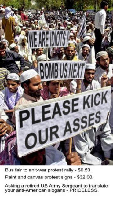 priceless-picture-Muslim-people-holding-up-signs-please-kick-our-asses